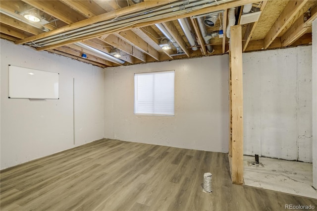 6840 Goldcrest Ct, Colorado Springs, CO 80919 - below grade area featuring wood finished floors