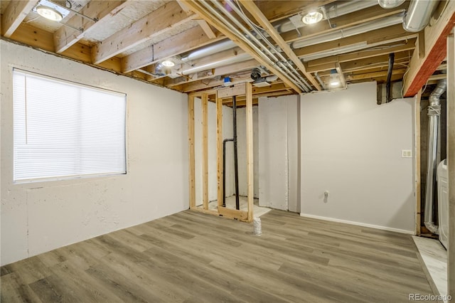 6840 Goldcrest Ct, Colorado Springs, CO 80919 - basement featuring wood finished floors
