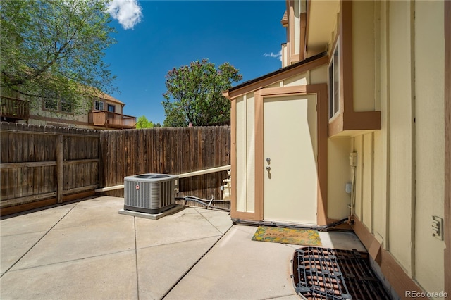 6840 Goldcrest Ct, Colorado Springs, CO 80919 - view of patio / terrace featuring central air condition unit and a fenced backyard
