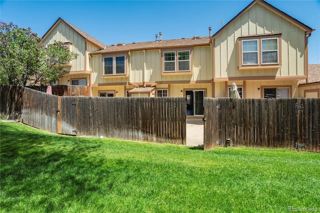 6840 Goldcrest Ct, Colorado Springs, CO 80919 - rear view of property with board and batten siding