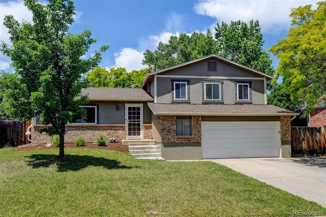 6775 Coors Ct, Arvada, CO 80004 - split level home with a garage, driveway, brick siding, and a shingled roof