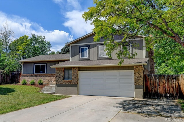 6775 Coors Ct, Arvada, CO 80004 - split level home with an attached garage, concrete driveway, and brick siding