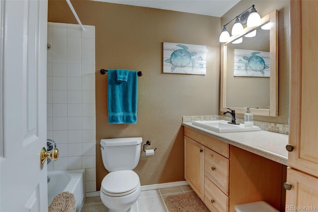 6775 Coors Ct, Arvada, CO 80004 - bathroom with vanity, tile patterned floors, and washtub / shower combination