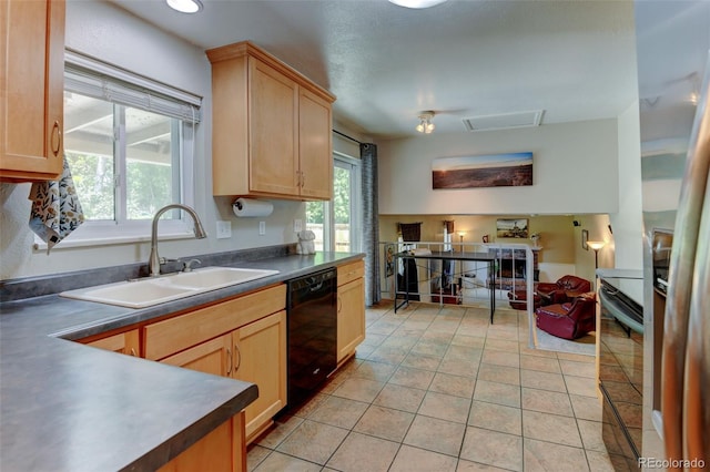 6775 Coors Ct, Arvada, CO 80004 - kitchen with black dishwasher, range, light brown cabinetry, dark countertops, and light tile patterned floors