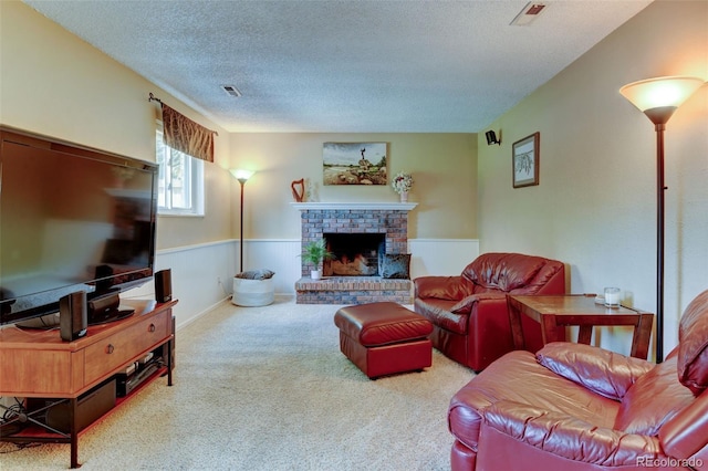6775 Coors Ct, Arvada, CO 80004 - carpeted living area with a textured ceiling and a fireplace