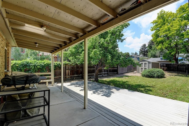 6775 Coors Ct, Arvada, CO 80004 - fenced backyard with a shed and a wooden deck