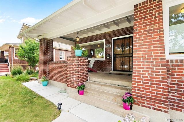 property entrance featuring covered porch