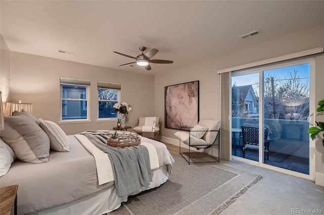 bedroom with access to exterior, ceiling fan, and carpet floors