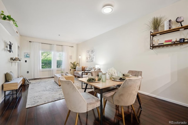 2895 W Riverwalk Cir Unit 104, Littleton, CO 80123 - dining space featuring wood finished floors and baseboards