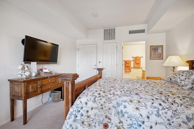 2895 W Riverwalk Cir Unit 104, Littleton, CO 80123 - bedroom with carpet flooring and connected bathroom