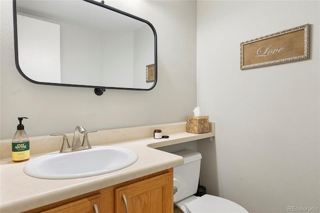 9756 Quay Loop, Broomfield, CO 80021 - half bathroom featuring toilet and vanity