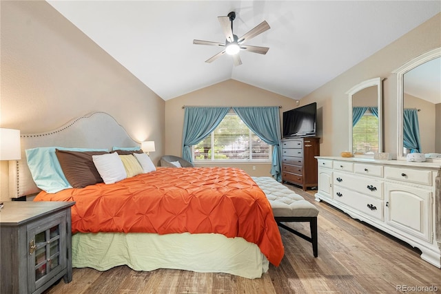 9756 Quay Loop, Broomfield, CO 80021 - bedroom with lofted ceiling, light wood finished floors, and a ceiling fan