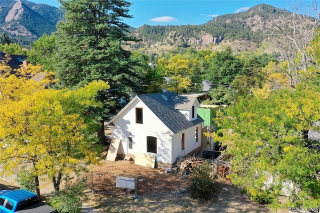 drone / aerial view featuring a mountain view