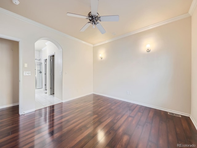 unfurnished room featuring ornamental molding, ceiling fan, and dark hardwood / wood-style flooring