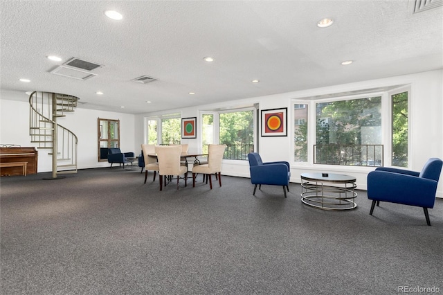 555 E 10th Ave Unit 206, Denver, CO 80203 - building lobby with a textured ceiling, stairs, and recessed lighting