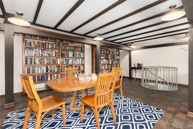 555 E 10th Ave Unit 206, Denver, CO 80203 - dining area featuring baseboards