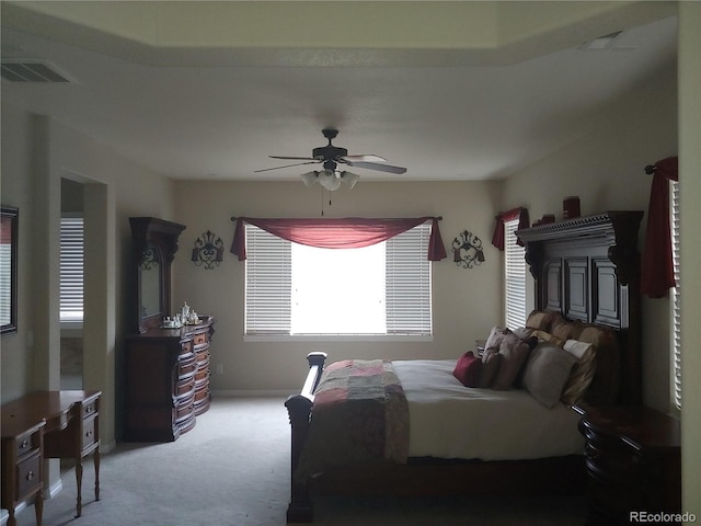 bedroom with ceiling fan and carpet