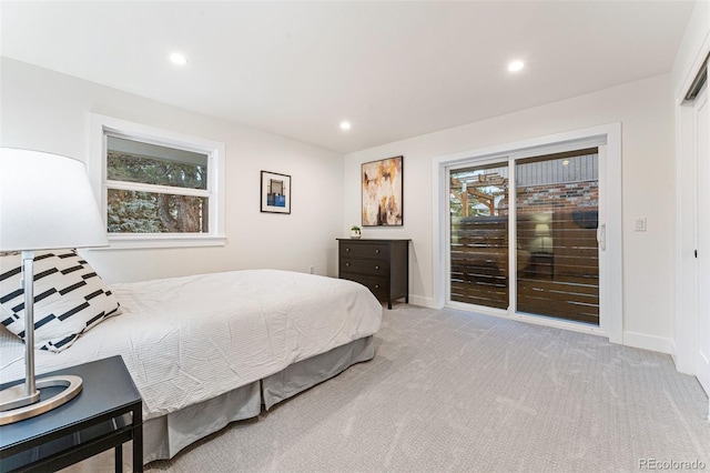 carpeted bedroom featuring baseboards, access to outside, and recessed lighting