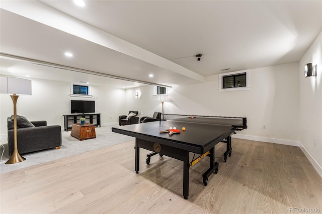 recreation room with baseboards, light wood-style flooring, and recessed lighting