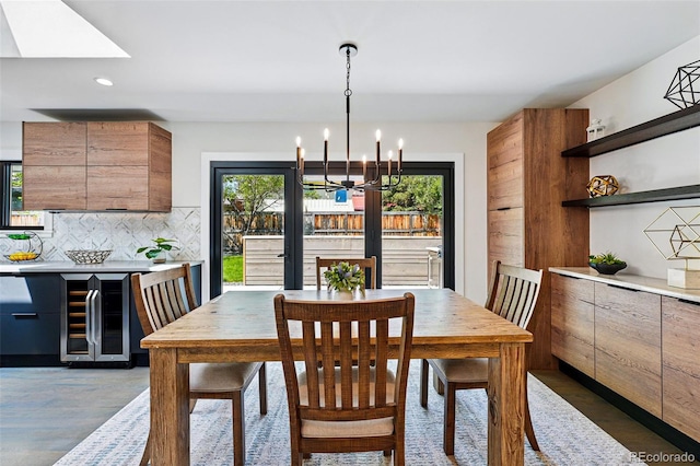 3275 19th St, Boulder, CO 80304 - dining room featuring a chandelier, recessed lighting, dark wood-style floors, and beverage cooler