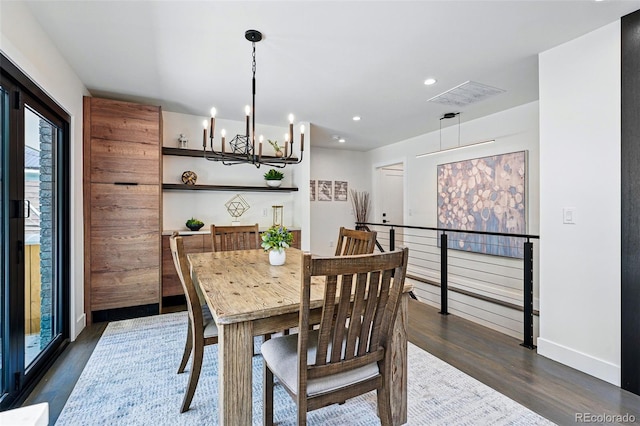 3275 19th St, Boulder, CO 80304 - dining space with dark wood finished floors, a chandelier, recessed lighting, and baseboards