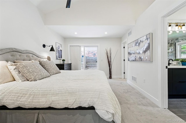 3275 19th St, Boulder, CO 80304 - carpeted bedroom with access to exterior, recessed lighting, baseboards, vaulted ceiling, and a sink