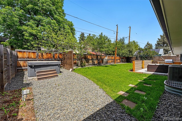 3275 19th St, Boulder, CO 80304 - view of yard featuring a hot tub, outdoor lounge area, a patio, and central AC