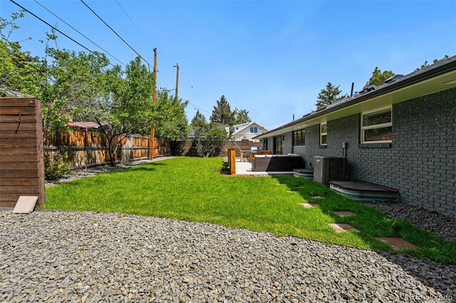 3275 19th St, Boulder, CO 80304 - view of yard with an outdoor living space, central AC, and a patio