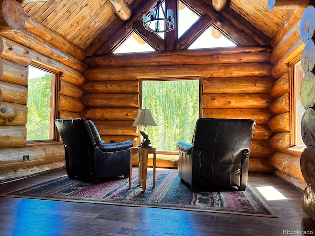 living area featuring beamed ceiling, high vaulted ceiling, log walls, and dark wood-type flooring