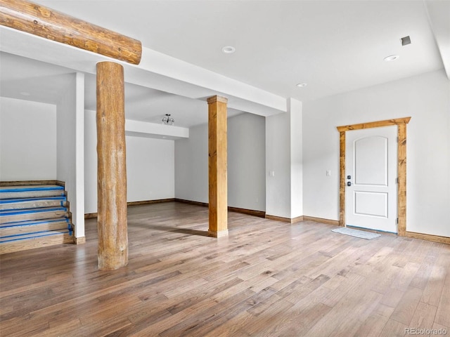 basement featuring hardwood / wood-style flooring