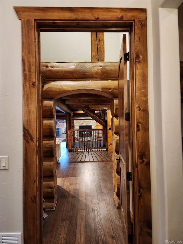 733 Rainbow Rd, Idaho Springs, CO 80452 - hall featuring wood-type flooring and log walls