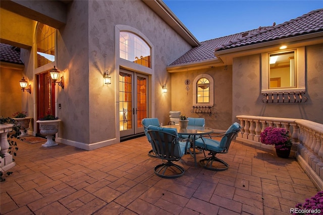 11541 Warrington Ct, Parker, CO 80138 - view of patio / terrace featuring french doors and outdoor dining space