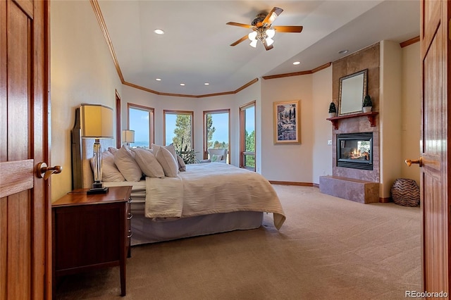 11541 Warrington Ct, Parker, CO 80138 - carpeted bedroom with ornamental molding, a tile fireplace, access to exterior, recessed lighting, and baseboards