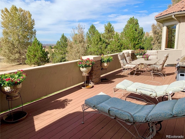 11541 Warrington Ct, Parker, CO 80138 - wooden terrace featuring outdoor dining area