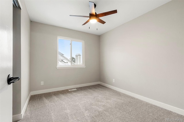 unfurnished room featuring carpet floors and ceiling fan