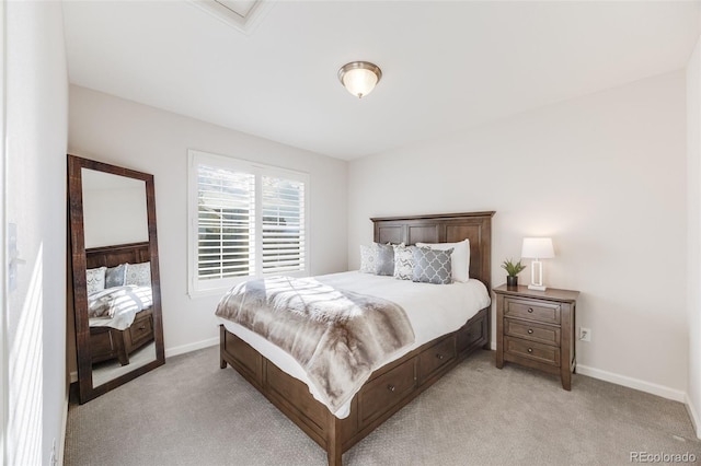 bedroom featuring light carpet