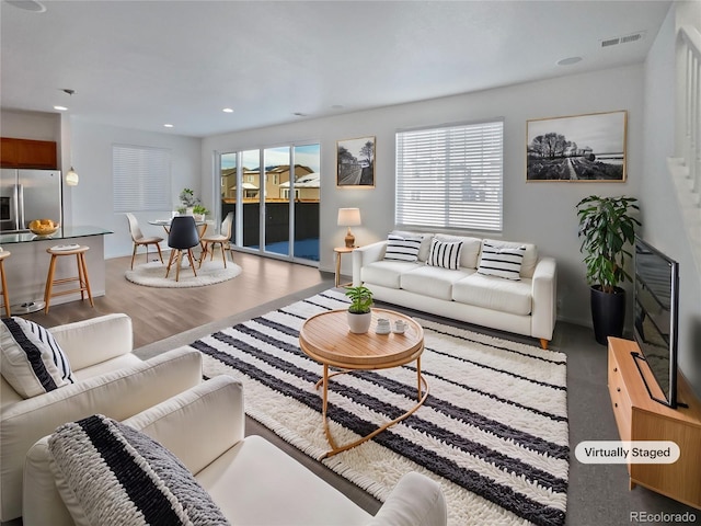 living room with hardwood / wood-style floors