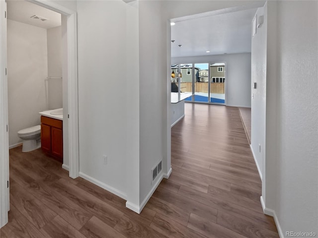 hallway featuring light hardwood / wood-style floors