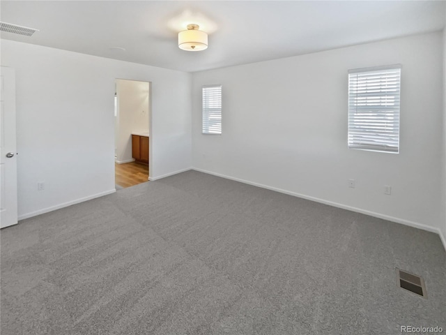 view of carpeted spare room