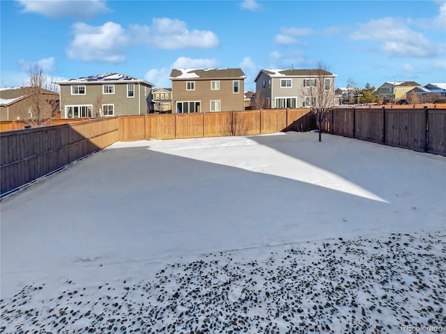 view of yard covered in snow