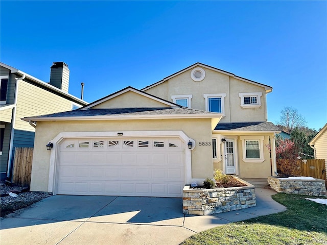 view of front property with a garage