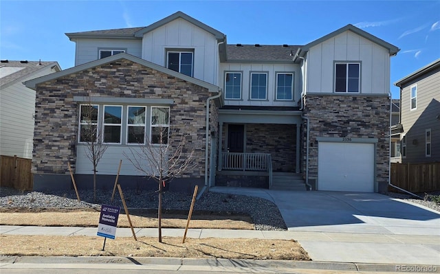 view of front of house featuring driveway, a porch, fence, board and batten siding, and an attached garage