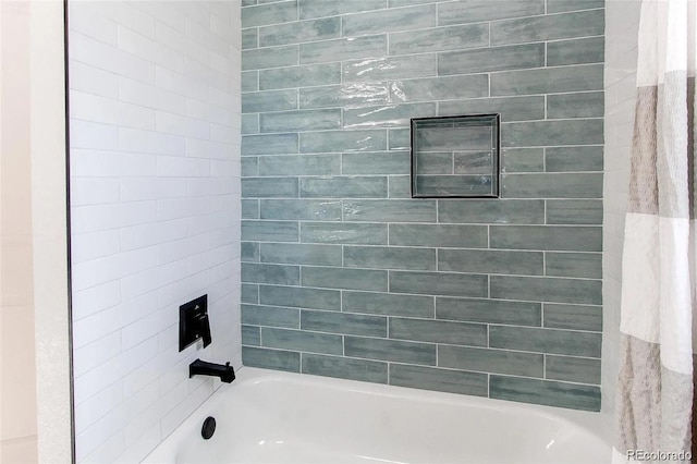 784 S 3rd Ave, Brighton, CO 80601 - bathroom featuring shower / bath combination with curtain