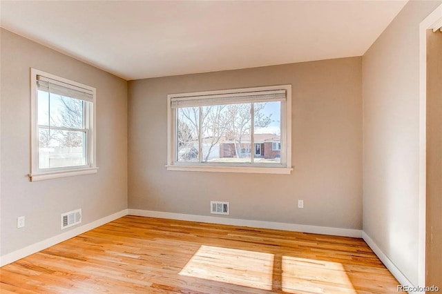 784 S 3rd Ave, Brighton, CO 80601 - unfurnished room featuring healthy amount of natural light, baseboards, and light wood finished floors