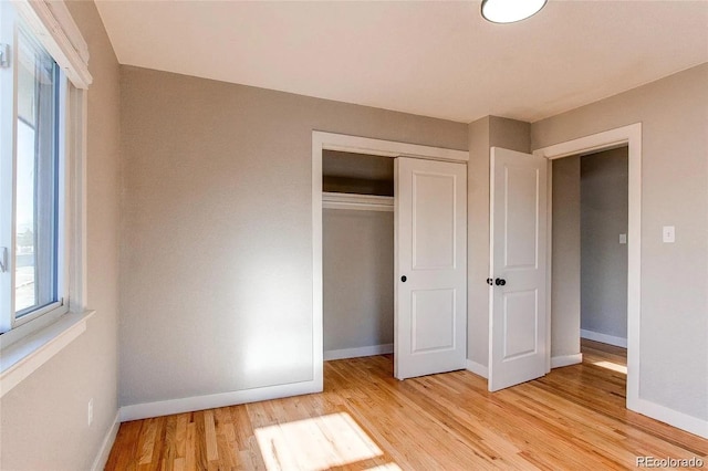 784 S 3rd Ave, Brighton, CO 80601 - unfurnished bedroom with light wood-type flooring, baseboards, and a closet