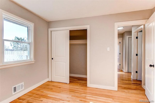 784 S 3rd Ave, Brighton, CO 80601 - unfurnished bedroom featuring light wood-style flooring, baseboards, and a closet