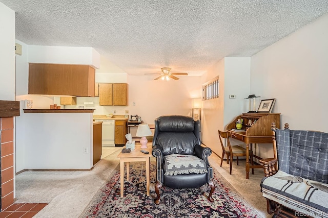 carpeted living room with a textured ceiling and ceiling fan