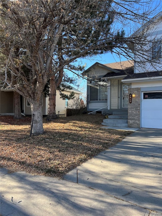 view of front of property featuring a garage