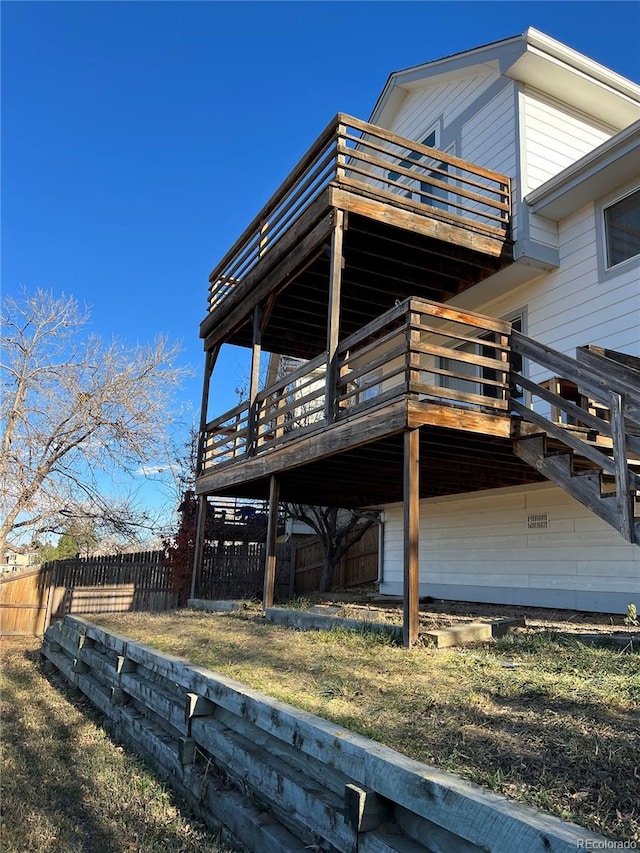 view of side of home featuring a deck