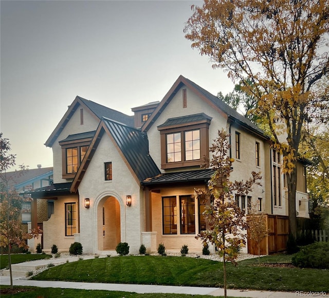 view of front of home with a front yard